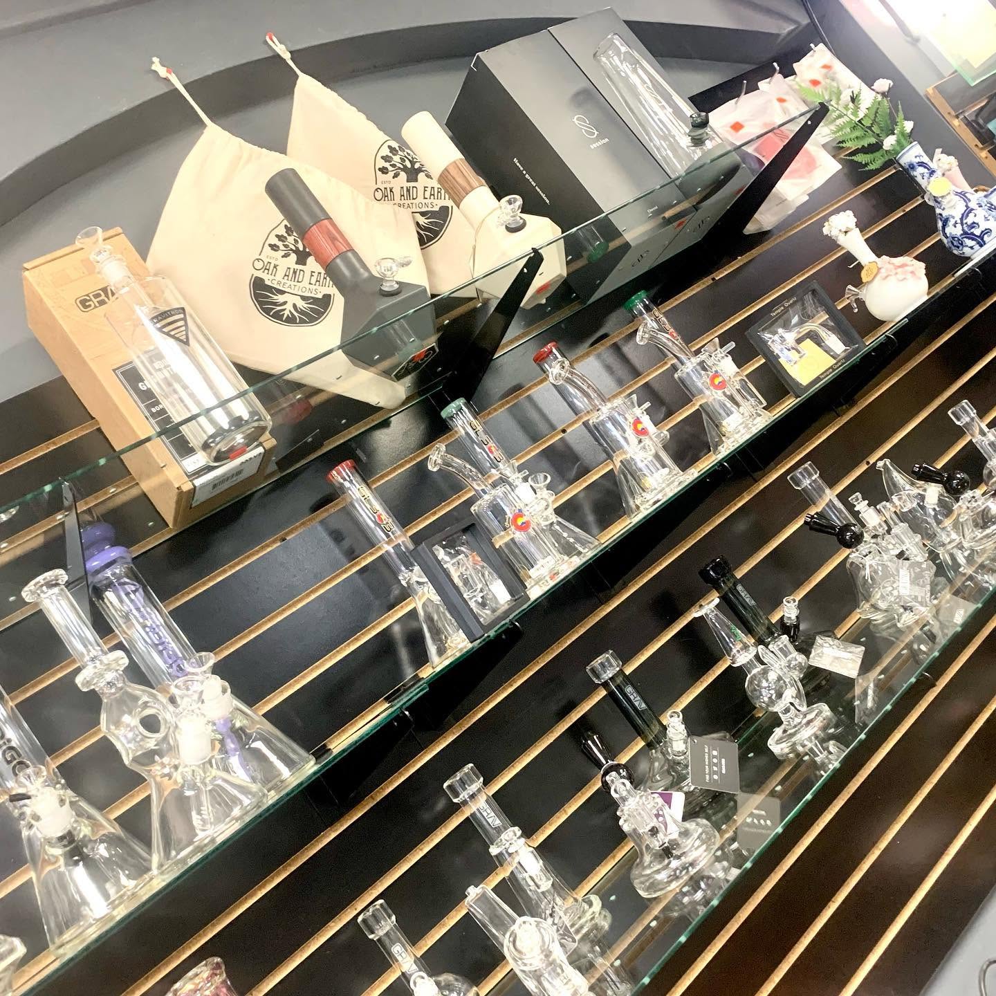 Glass pieces displayed on shelves inside Germantown Vapor